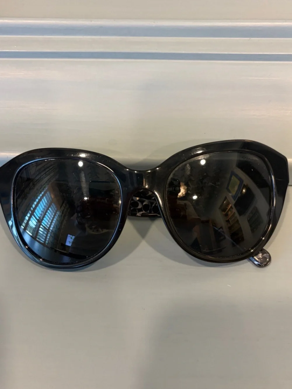 Coach Black Cat-Eye Sunglasses with Dark Lenses